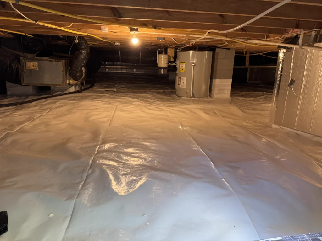 Encapsulated crawl space in Chapel Hill with new vapor barrier and moisture control upgrades.