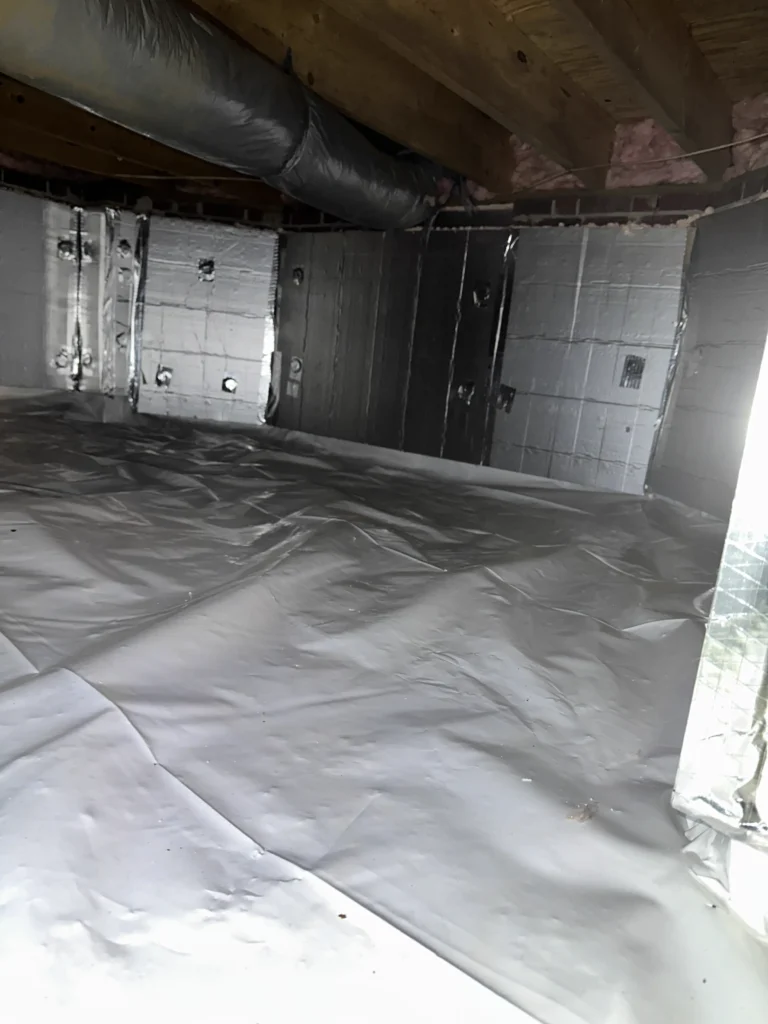 Fully encapsulated crawl space in Cary, NC after professional mold remediation, vapor barrier installation, and dehumidifier setup by EcoCrawls. Clean, sealed, and dry.